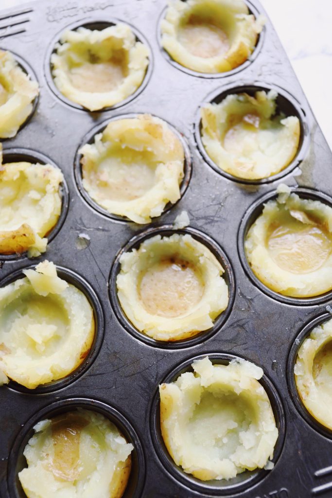 Smashed baked potatoes with cheddar